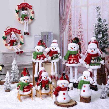 Christmas snowman sitting figure doll
