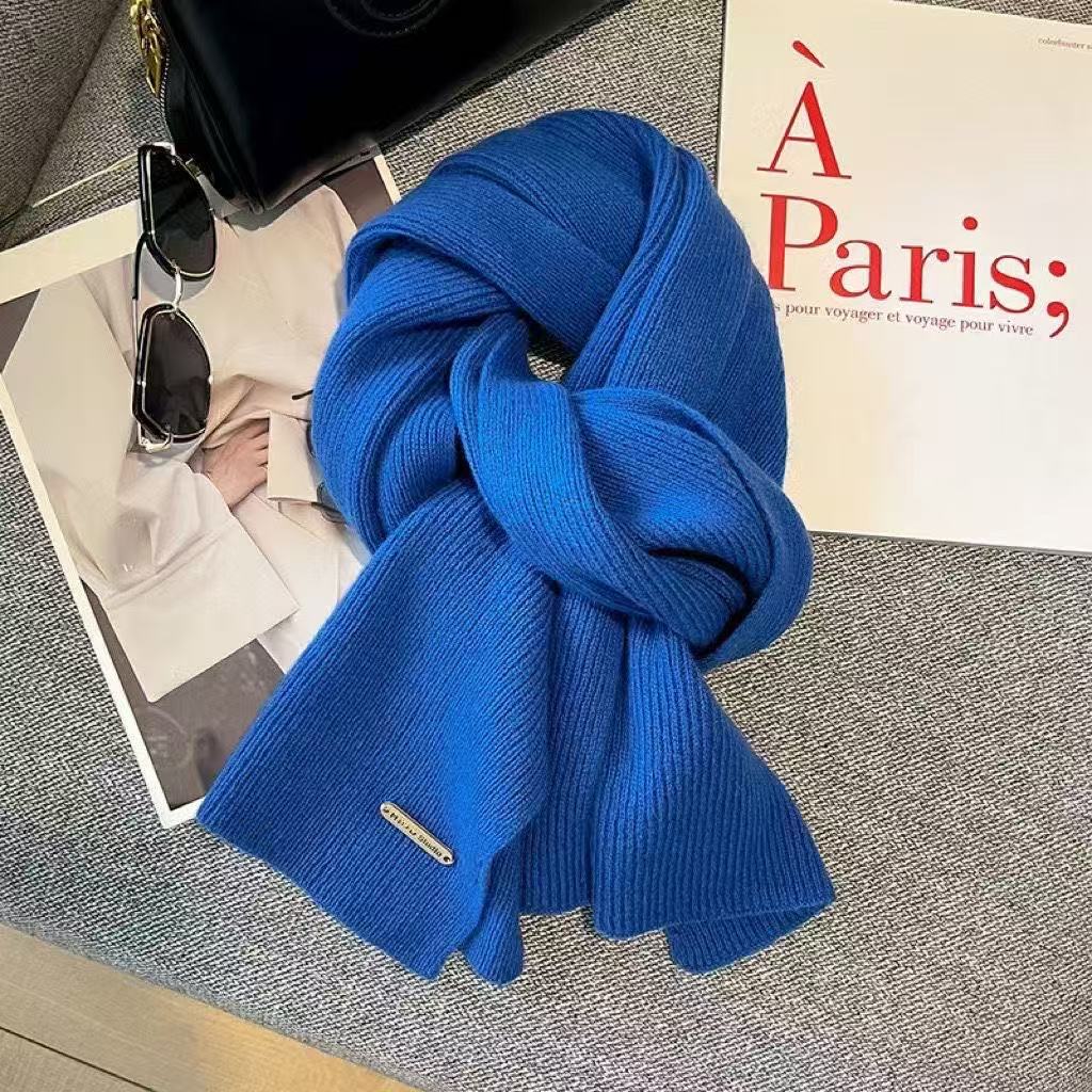 Knitted Winter Scarf with Christmas Patterns